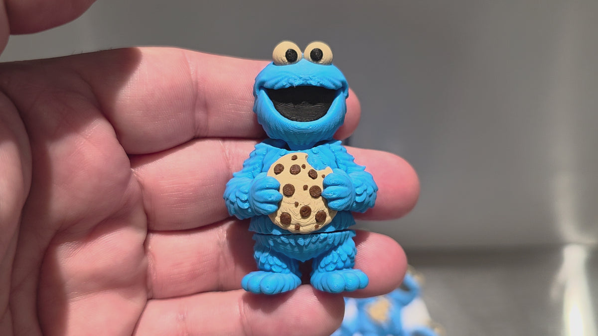 Articulated Cooky Monster Minifigure Collectible Keychain.