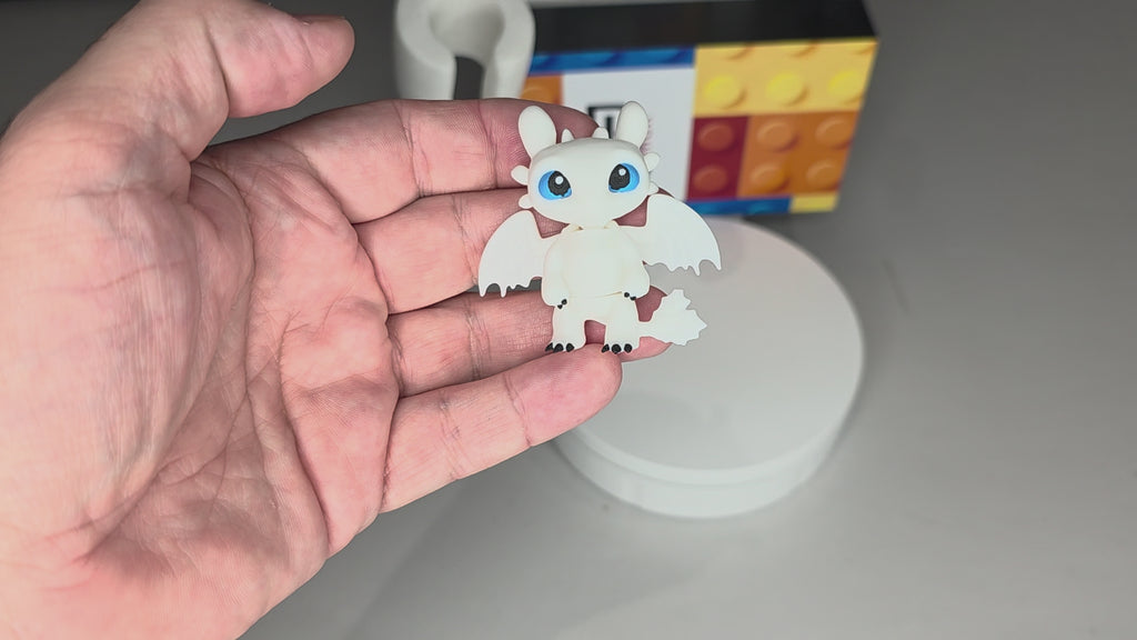 Articulated Light Fury Minifigure Collectible Keychain.
