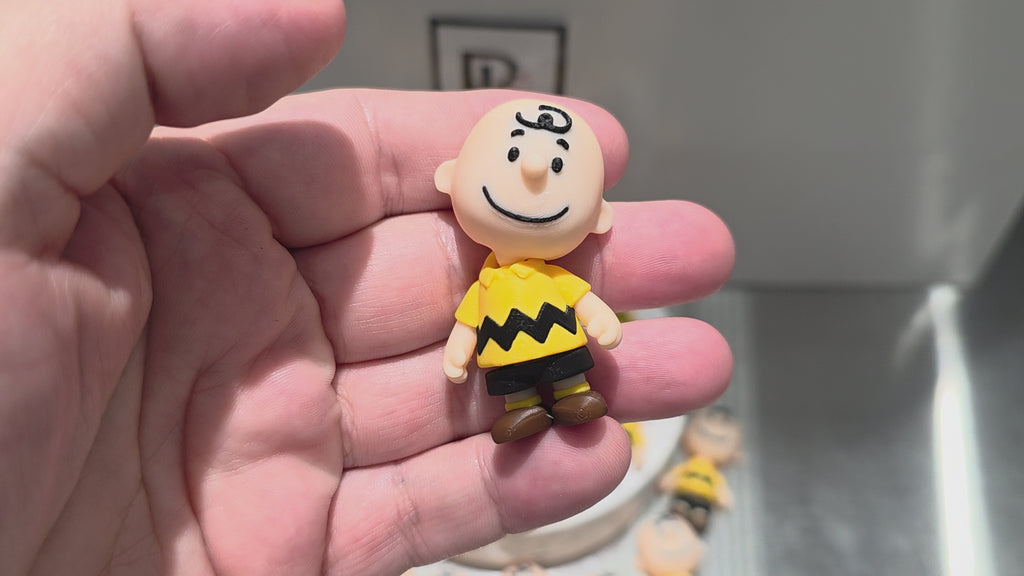 Articulated Charlie Brown Minifigure Collectible Keychain.