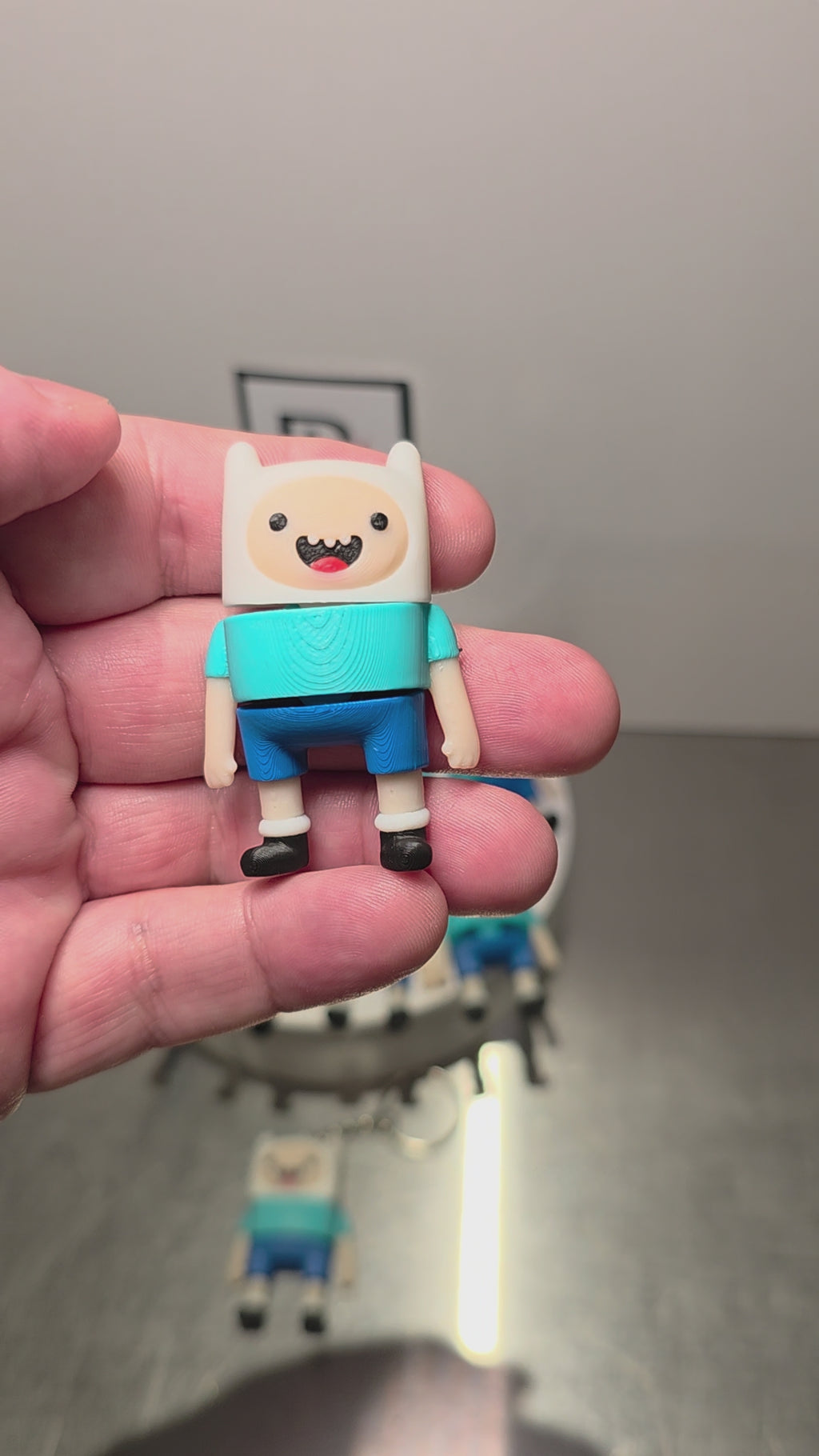 Articulated Finn Minifigure Collectible Keychain.