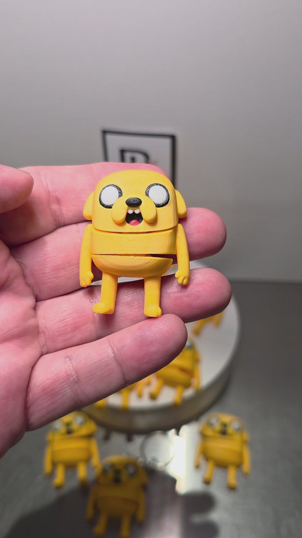 Articulated Jake Minifigure Collectible Keychain.