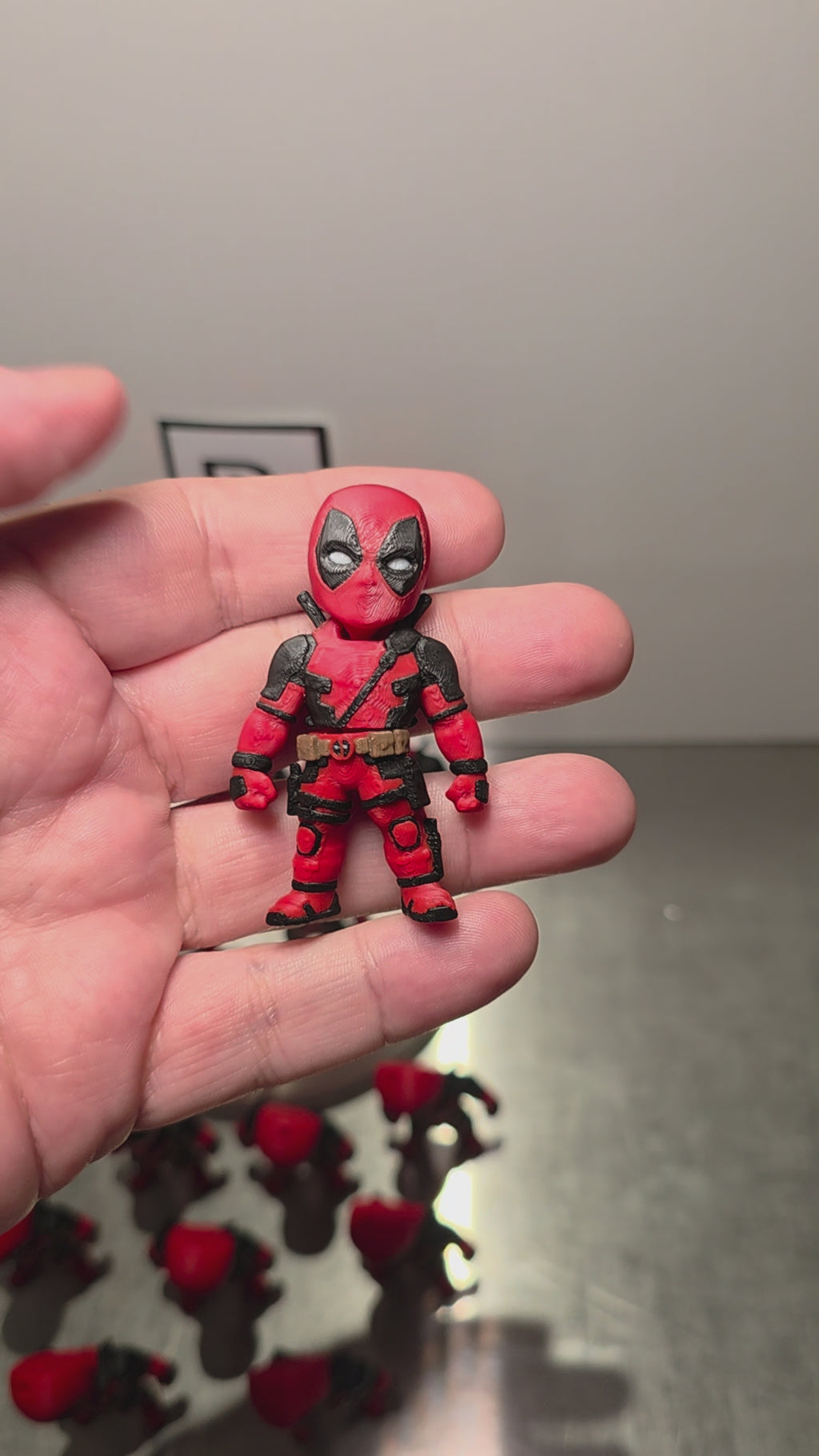 Articulated Deadpool Minifigure Collectible Keychain.