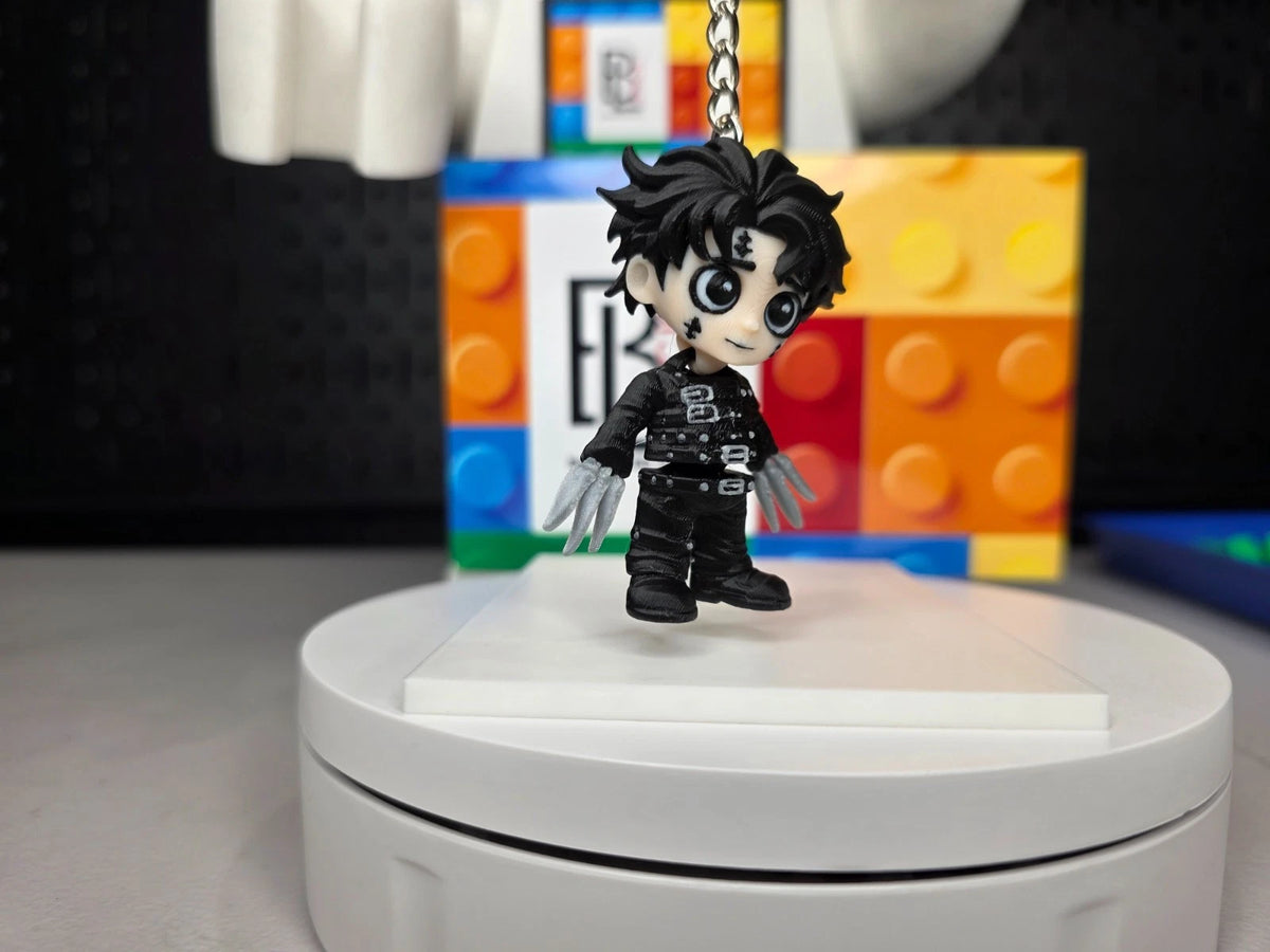 Articulated Edward Scissorhands Minifigure Collectible Keychain.